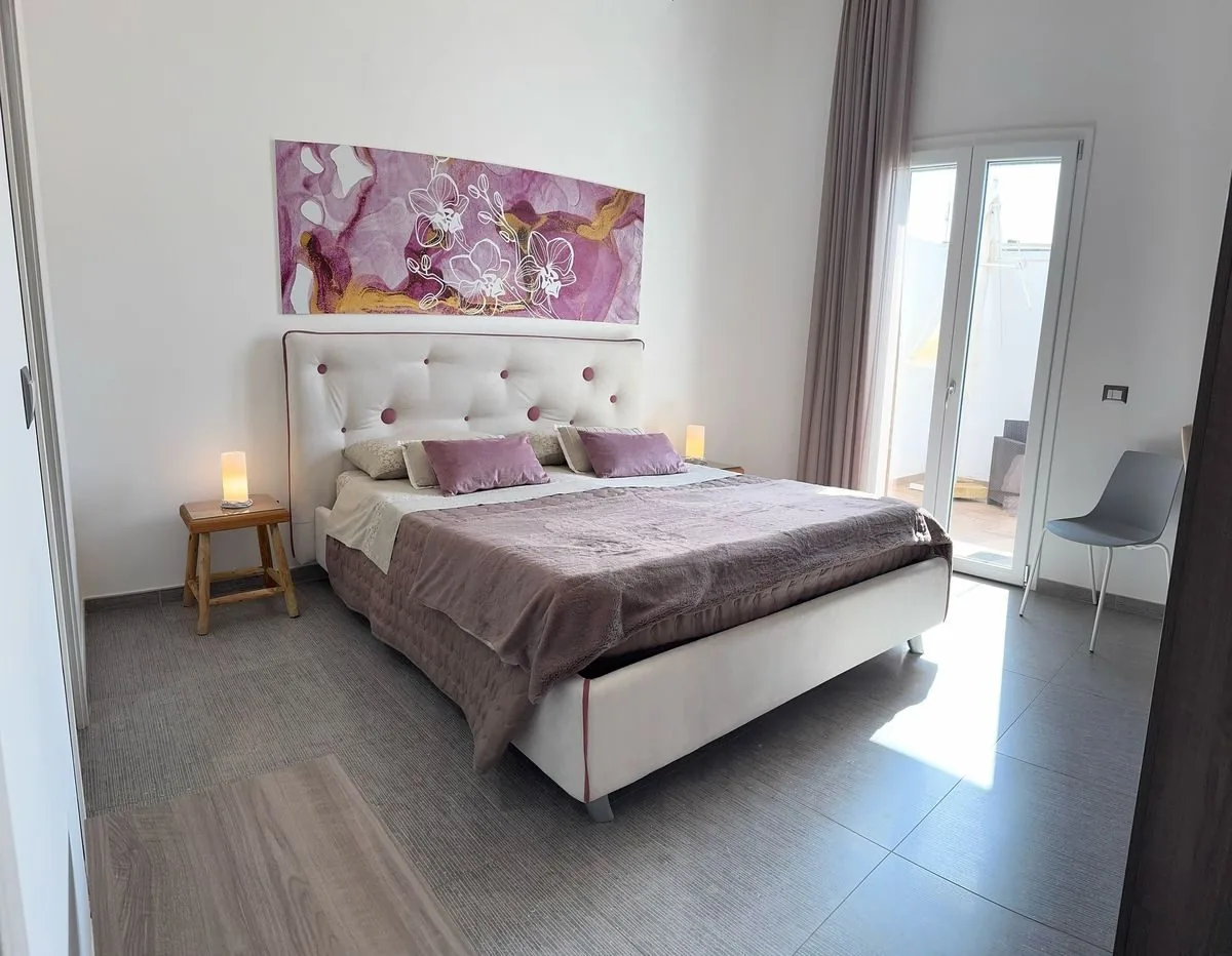 Camera Orchidea — Deluxe con terrazza privata